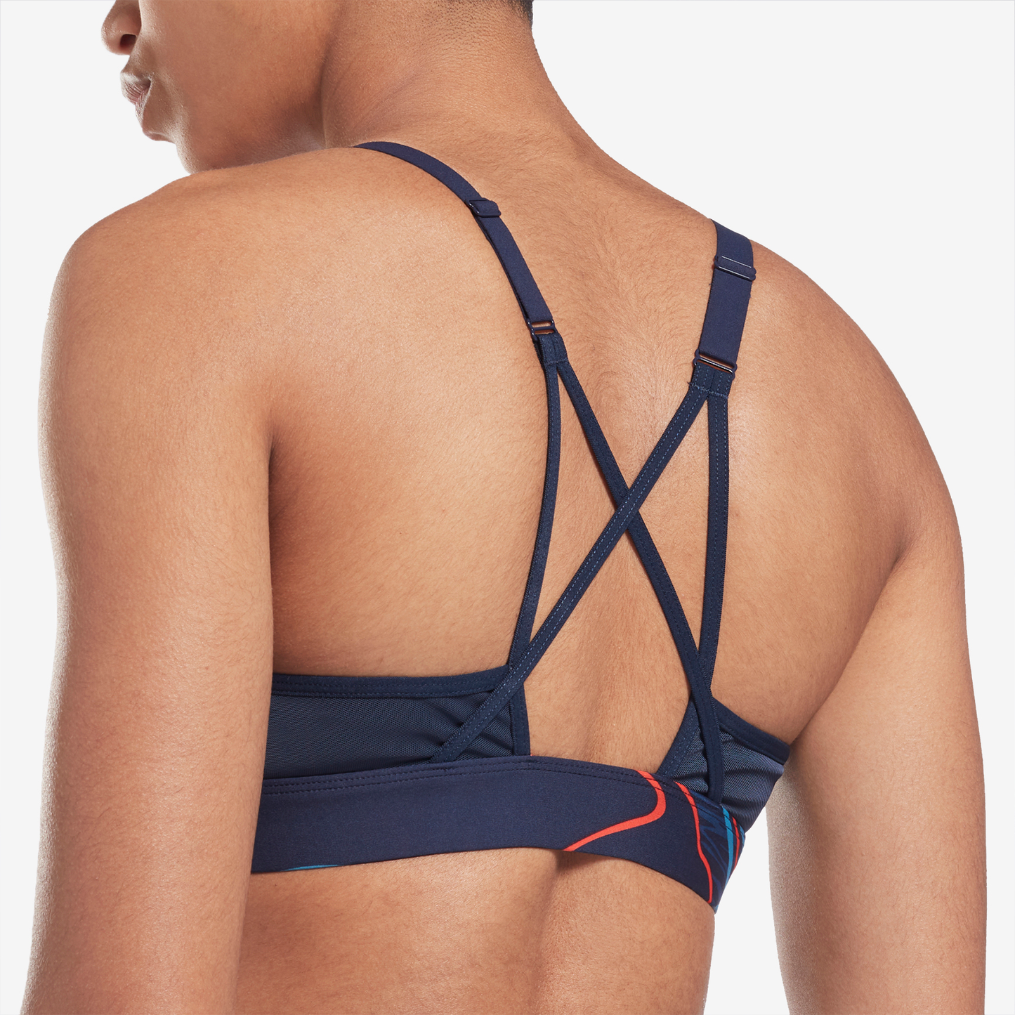 TOP REEBOK LUX STRAPPY - MEDIUM IMPACT COL8F-H49062